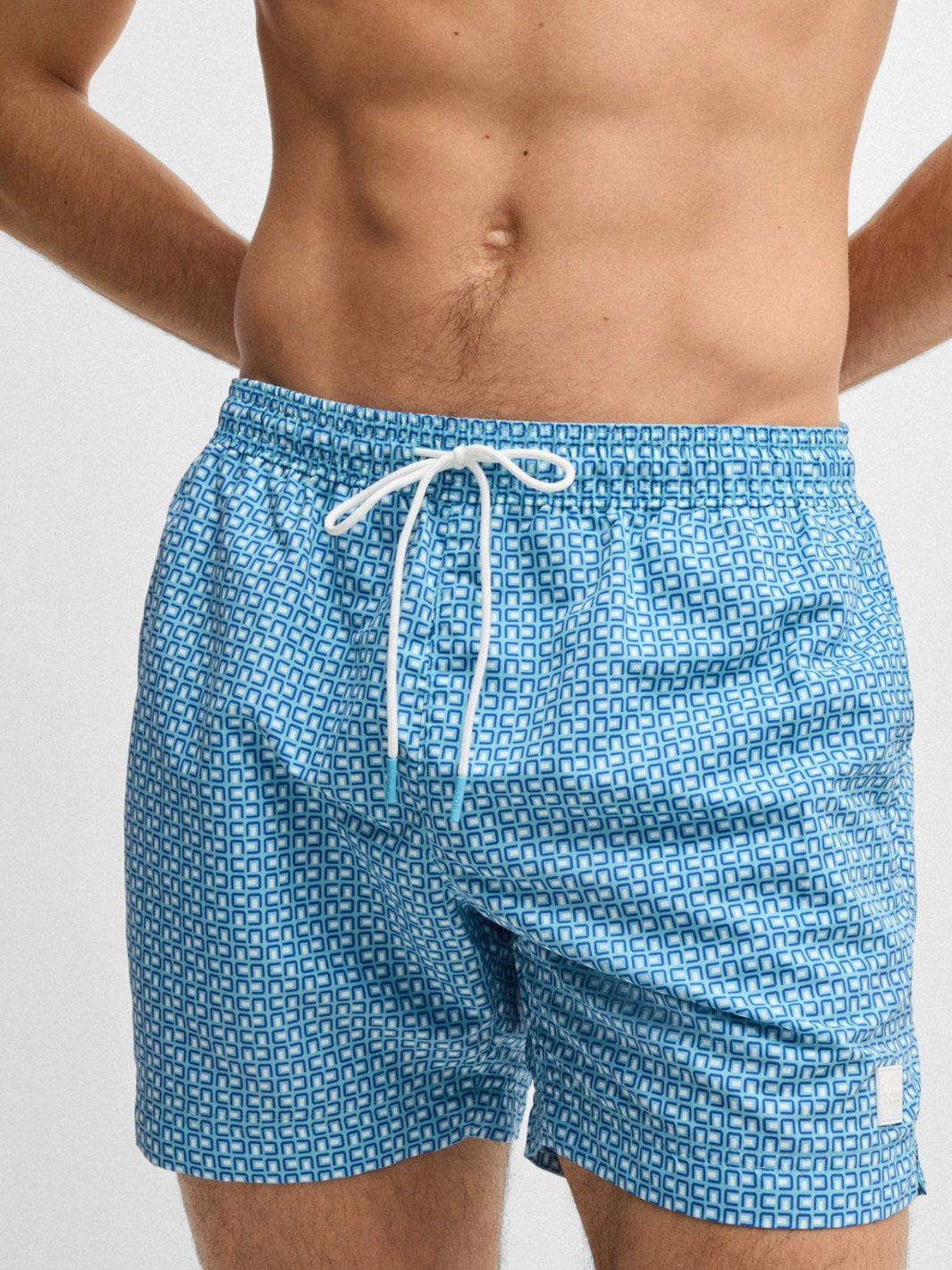 DRAWSTRING SWIM SHORTS