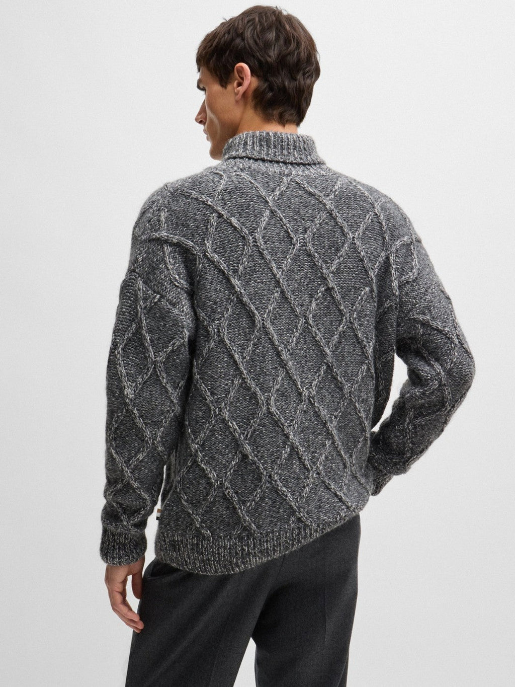 RELAXED-FIT CABLE KNIT SWEATER